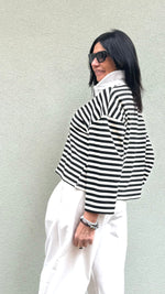 POLO A RIGHE BIANCA E NERA