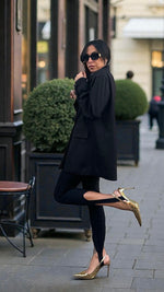 LEGGINS CON STAFFA NERO